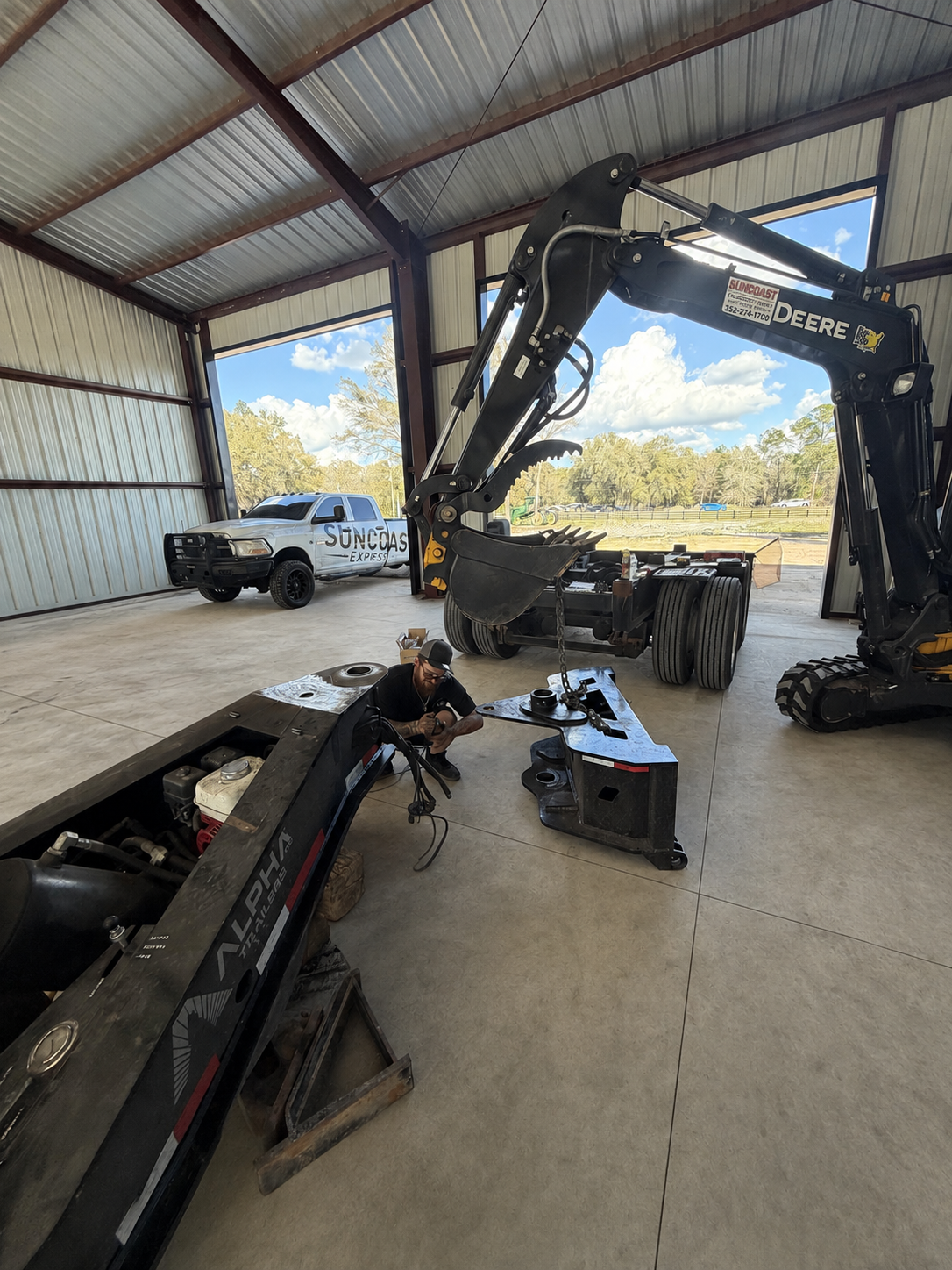 Heavy-haul trailer stinger separated for bushing and pin replacement in the SEG repair shop